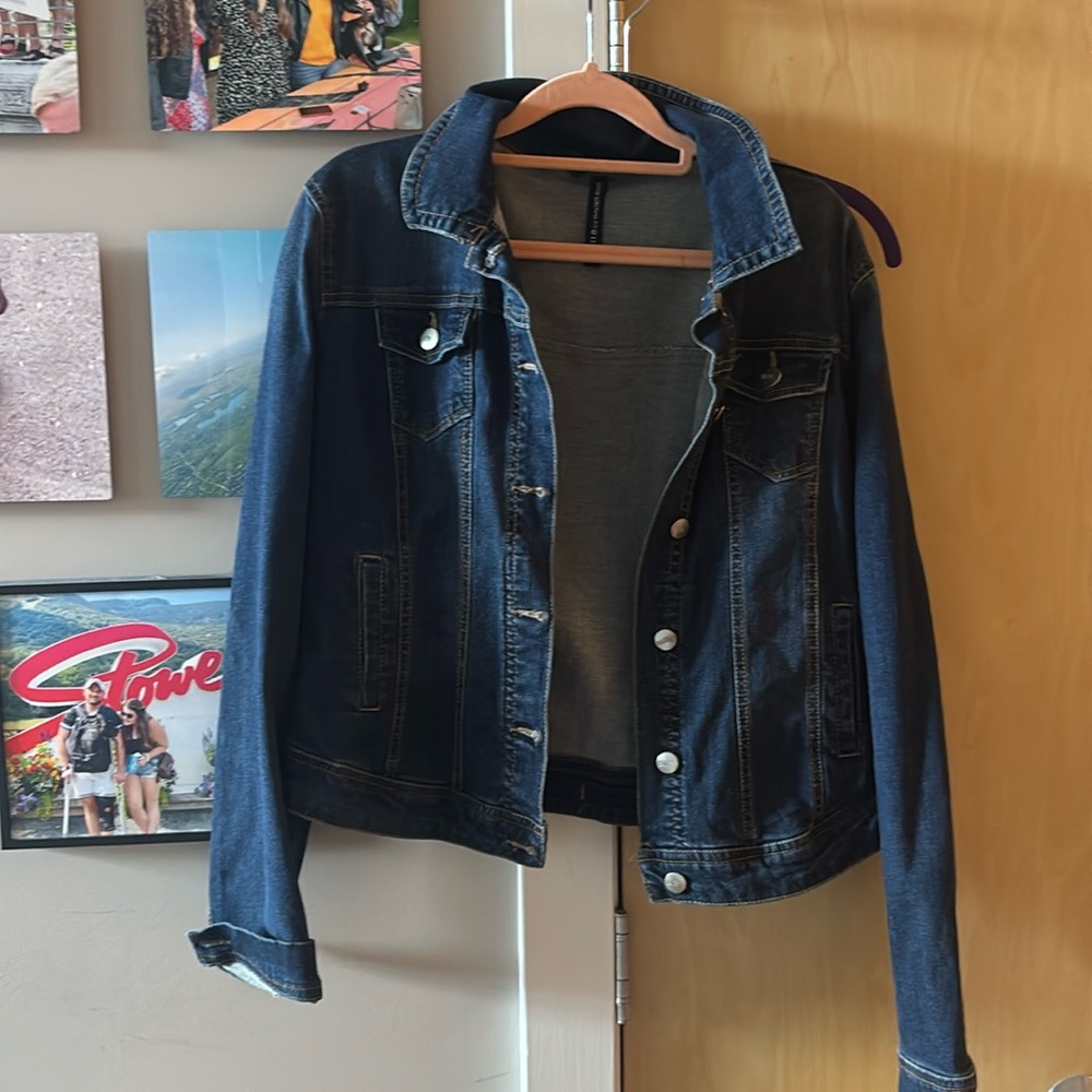 Woman’s Dark Blue Jean Jacket size Large